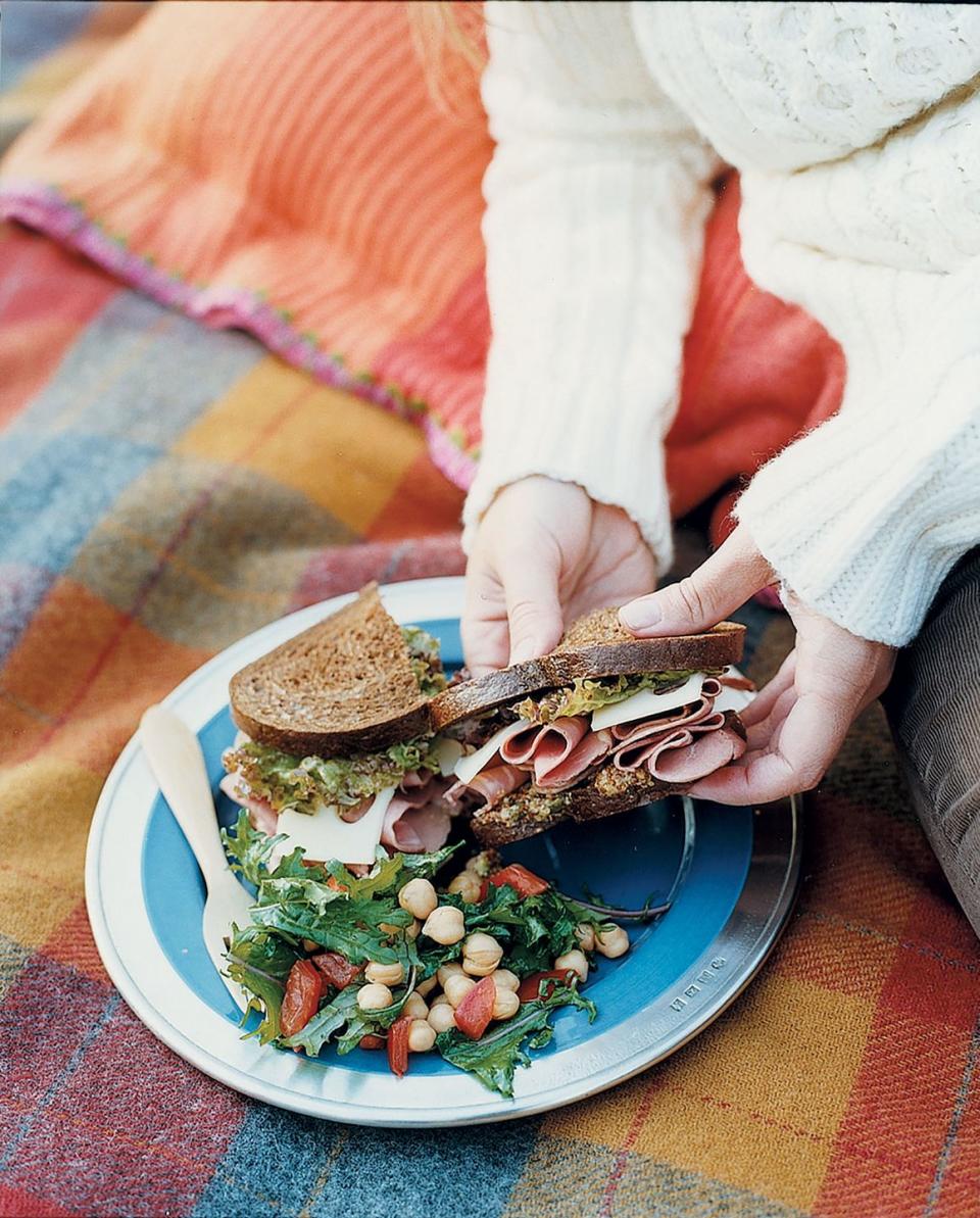 <p>Looking for a low-lift meal to celebrate without having to dirty a bunch of dishes? Sliced corned beef makes an excellent sandwich!</p><p><strong><a href="https://www.countryliving.com/food-drinks/recipes/a1027/corned-beef-pumpernickel-sandwiches-3132/" rel="nofollow noopener" target="_blank" data-ylk="slk:Get the recipe;elm:context_link;itc:0;sec:content-canvas" class="link ">Get the recipe</a>.</strong></p>