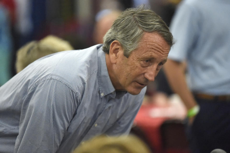 Former U.S. Rep. Mark Sanford speaks with attendees at U.S. Rep. Jeff Duncan's annual fundraiser on Monday, Aug. 26, 2019, in Anderson, S.C. Sanford is mulling a 2020 GOP challenge to President Donald Trump. (AP Photo/Meg Kinnard)