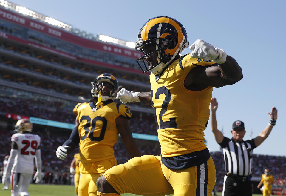 Los Angeles Rams wide receiver Brandin Cooks (12) celebrates after scoring a touchdown against the San Francisco 49ers during the first half of an NFL football game in Santa Clara, Calif., Sunday, Oct. 21, 2018. (AP Photo/Tony Avelar)