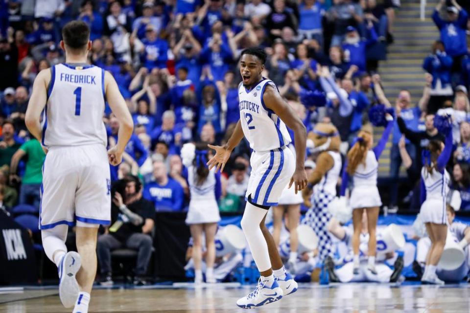 Kentucky guard Antonio Reeves (12) celebrates making a three-pointer against Providence during the NCAA Tournament first-round game at Greensboro Coliseum in Greensboro, N.C., on Friday.