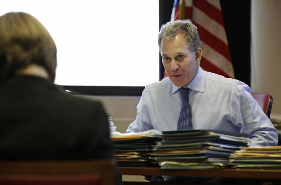 FILE - In this Feb. 17, 2017, file photo, New York State Attorney General Eric Schneiderman speaks to colleagues at his New York City office. Schneiderman is fighting to emerge as a major player in the liberal resistance to President Donald Trump and may be positioned to challenge Trump’s agenda in ways his Democratic allies in Washington cannot. (AP Photo/Frank Franklin II, File)