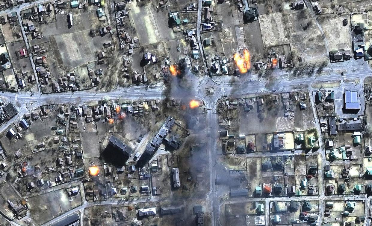 A satellite image shows burning homes in Chernihiv, Ukraine, in March 2022. <a href="https://media.gettyimages.com/id/1239246974/photo/10-maxar-satellite-multispectral-image-view-of-burning-homes-in-residential-area-of-chernihiv.jpg?s=1024x1024&w=gi&k=20&c=_9zuz2w6eePXNPf2UVL4bt7RvCV23e_zm7gUI5WdmI4=" rel="nofollow noopener" target="_blank" data-ylk="slk:Satellite image (c) 2022 Maxar Technologies.;elm:context_link;itc:0;sec:content-canvas" class="link ">Satellite image (c) 2022 Maxar Technologies.</a>