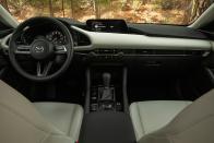 <p>The cumulative effect is that the 3's interior exudes a quality similar to that of high-end audio equipment or cars that costs tens of thousands more than <a rel="nofollow noopener" href="https://www.caranddriver.com/news/a26011657/2019-mazda-3-sedan-hatchback-pricing/" target="_blank" data-ylk="slk:the new 3's $21,895 base price;elm:context_link;itc:0;sec:content-canvas" class="link ">the new 3's $21,895 base price</a>.</p>