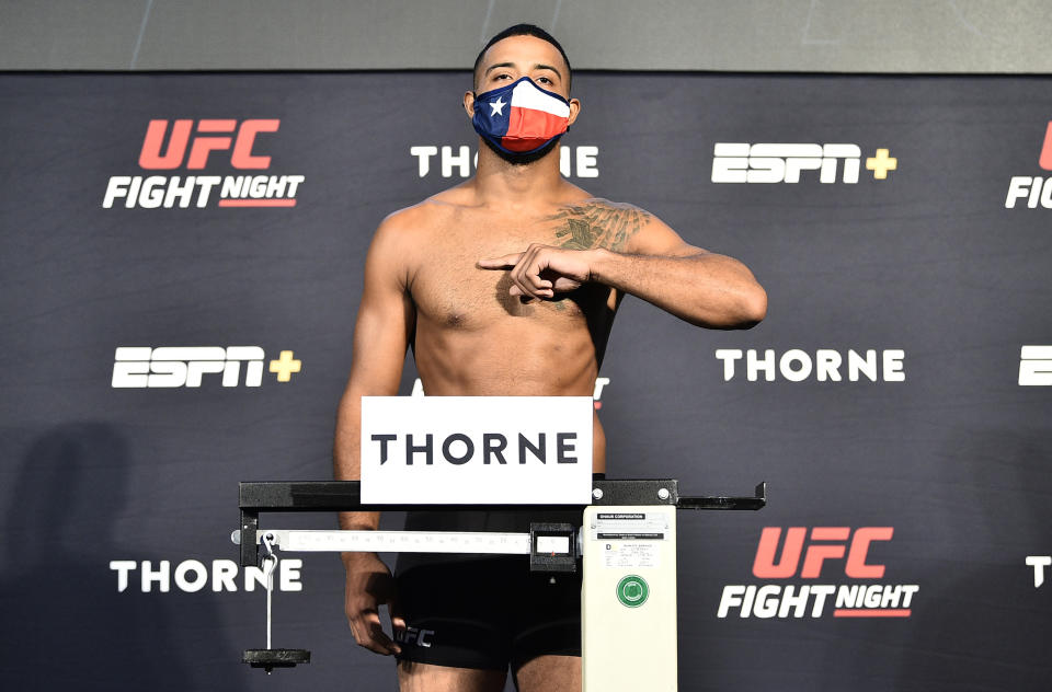 LAS VEGAS, NEVADA - JULY 31: In this handout image provided by UFC, Trevin Giles poses on the scale during the UFC Fight Night weigh-in at UFC APEX on July 31, 2020 in Las Vegas, Nevada. (Photo by Chris Unger/Zuffa LLC via Getty Images)