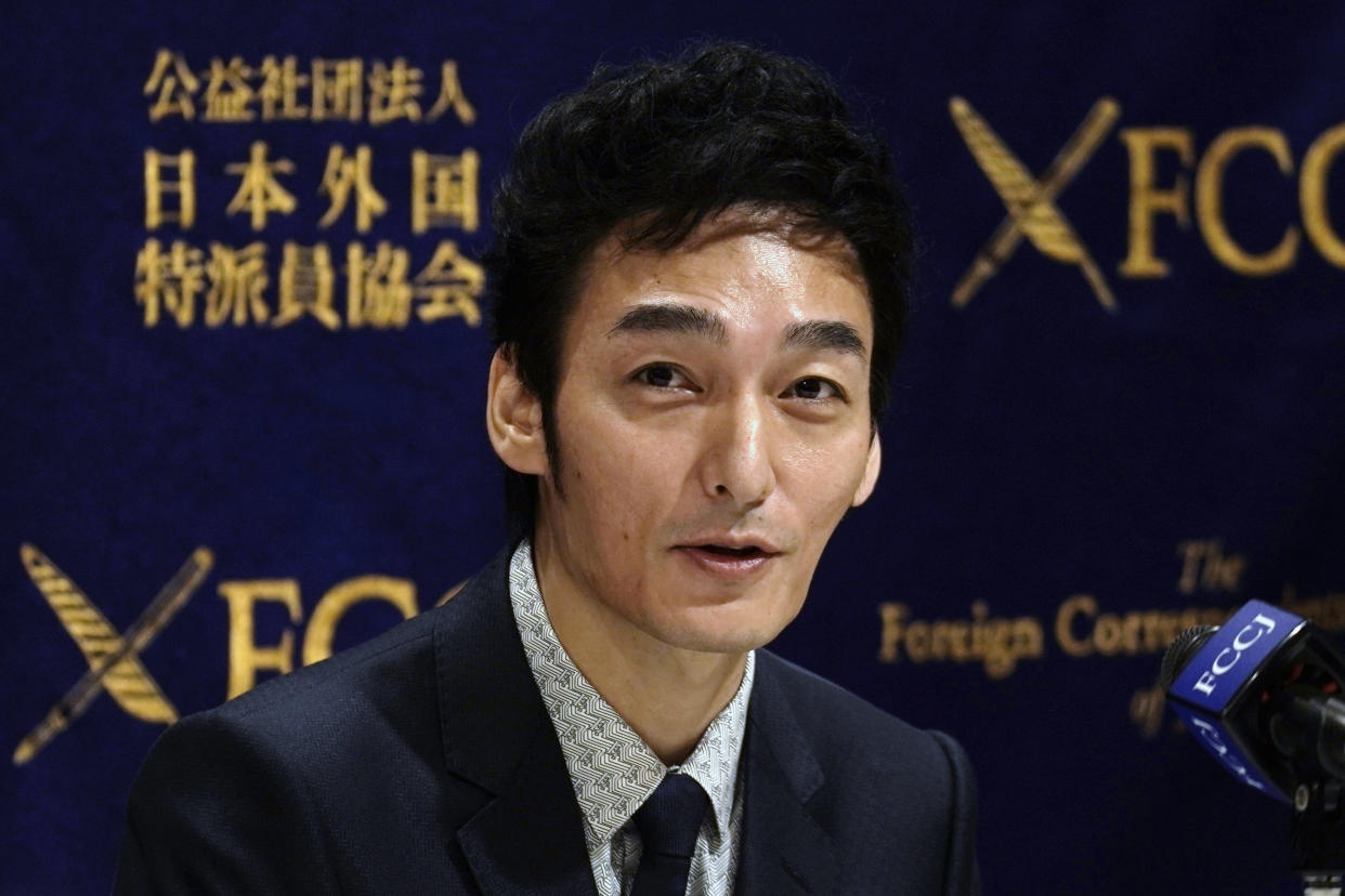 Tsuyoshi Kusanagi, a former member of Japanese popular pop group SMAP, speaks during a press conference of a new film "Midnight Swan" at Foreign Correspondents' Club of Japan in Tokyo Friday, Oct. 9, 2020. (AP Photo/Eugene Hoshiko)