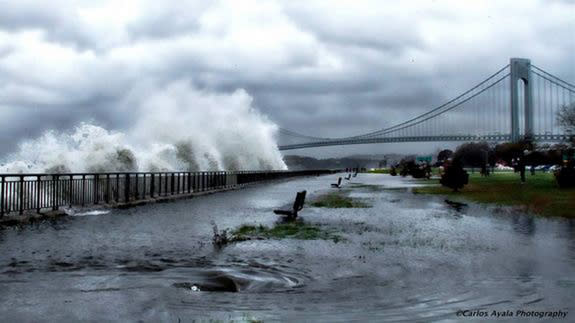 Waves crash ashore near the Verrazano Bridge in Brooklyn, N.Y., ahead of Hurricane Sandy's landfall on Monday, Oct. 29, 2012.