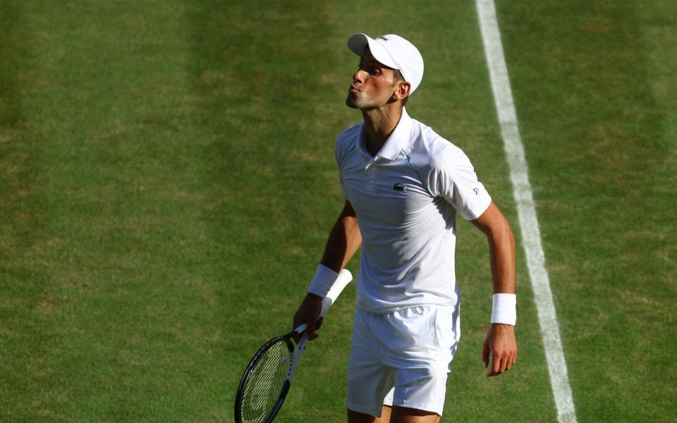 Furious Novak Djokovic blows kiss at Wimbledon hecklers - Reuters