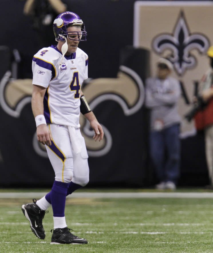 Minnesota Vikings quarterback Brett Favre (4) walks off the field after throwing an interception picked off by New Orleans Saints cornerback Tracy Porter during the fourth quarter of the NFC Championship NFL football game in New Orleans, Sunday, Jan. 24, 2010. (AP Photo/Bill Haber)