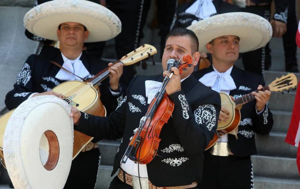 Mariachi Juvenil Colotlán violinist Juan Manuel Murrillo sings ‘México Lindo y Querido’ during the Memorial Day ceremony at Courthouse Park in Madera on May 29, 2023.