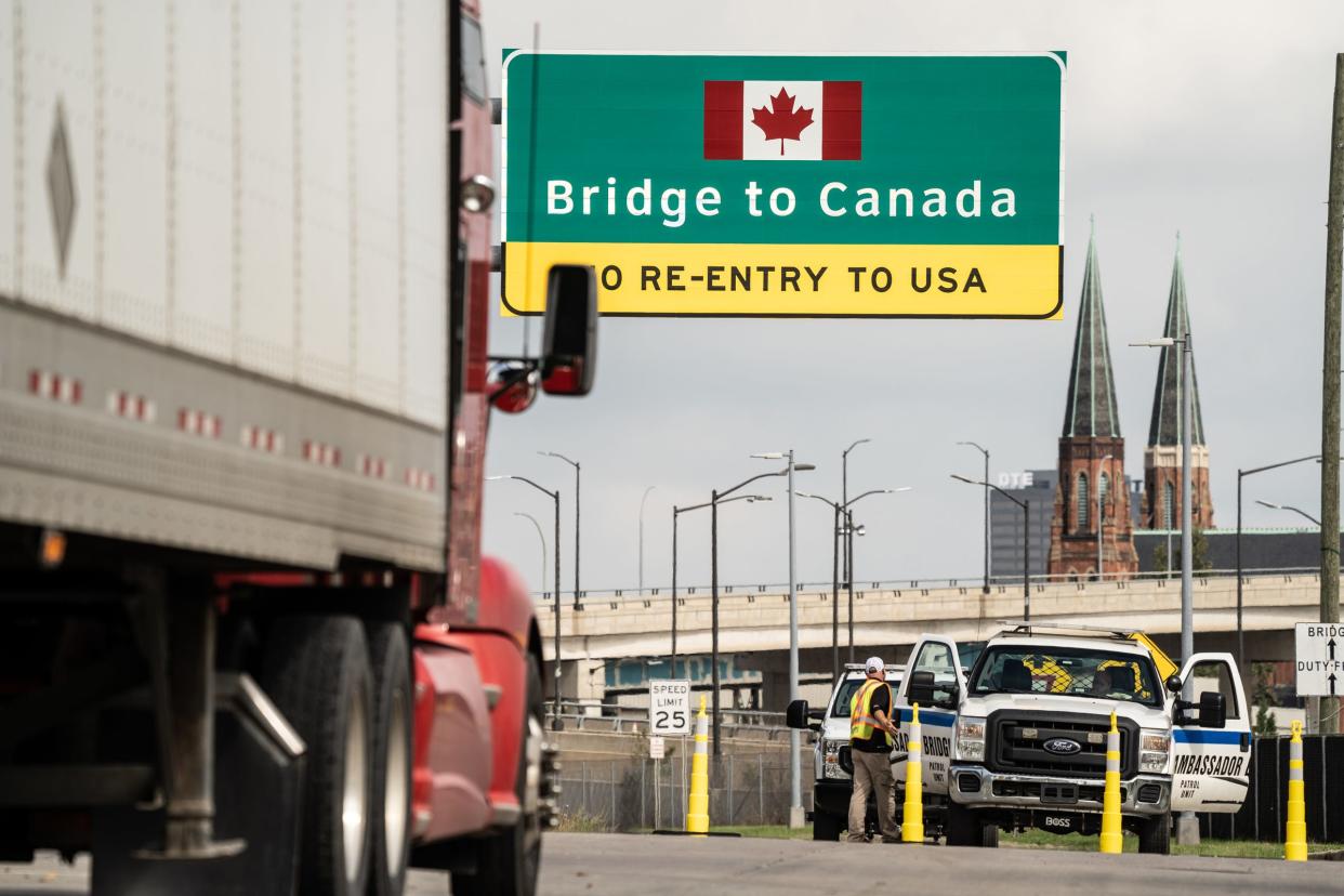 An Ambassador Bridge Patrol Unit vehicle blocks entrance for vehicles to be able to cross over to Windsor off of West Grand Boulevard in Detroit on Monday, Oct. 4, 2021. Potential explosives were discovered in a vehicle crossing the Ambassador Bridge Monday morning, leading officials to close the bridge while they investigate. Canadian border officials found the possible explosives during at the secondary inspection area and alerted Windsor police, according to officials. No threat was believed to be associated with the discovery and police believe it to be an isolated incident.