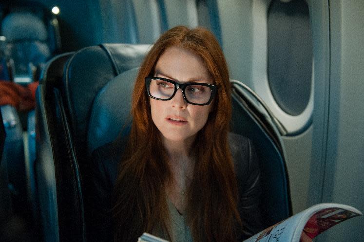 This image released by Universal Pictures shows Julianne Moore in a scene from "Non-Stop." (AP Photo/Universal Pictures, Myles Aronowitz)