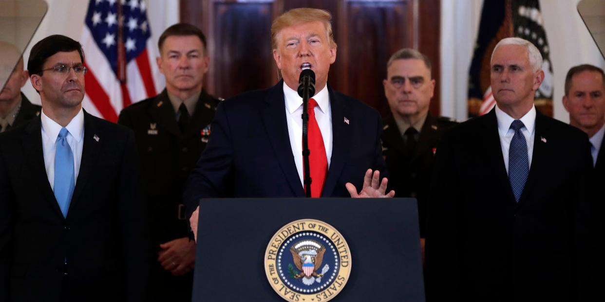 President Donald Trump addresses the nation from the White House on the ballistic missile strike that Iran launched against Iraqi air bases housing U.S. troops, Wednesday, Jan. 8, 2020, in Washington, as Secretary of Defense Mark Esper, Chairman of the Joint Chiefs of Staff Gen. Mark Milley, and Vice President Mike Pence, and others look on. (AP Photo/ Evan Vucci)