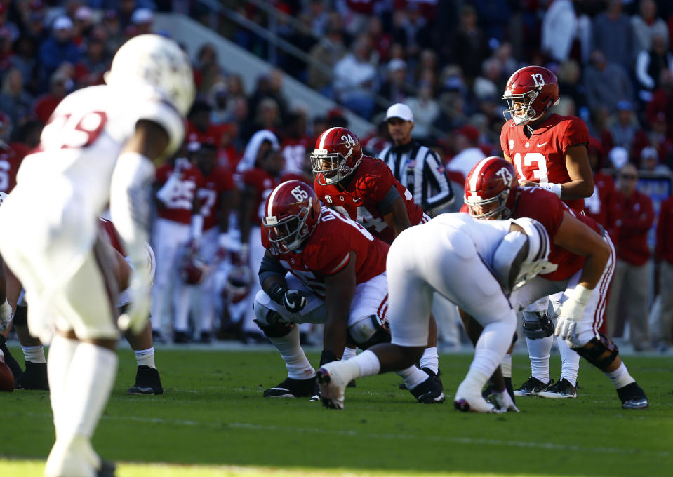 Alabama quarterback Tua Tagovailoa (13) waits for the snap during the first half of an NCAA college football game against Mississippi State, Saturday, Nov. 10, 2018, in Tuscaloosa, Ala. (AP Photo/Butch Dill)