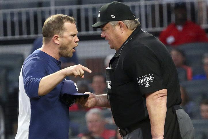 Padres manager Andy Green gives umpire Joe West an earful. (AP)