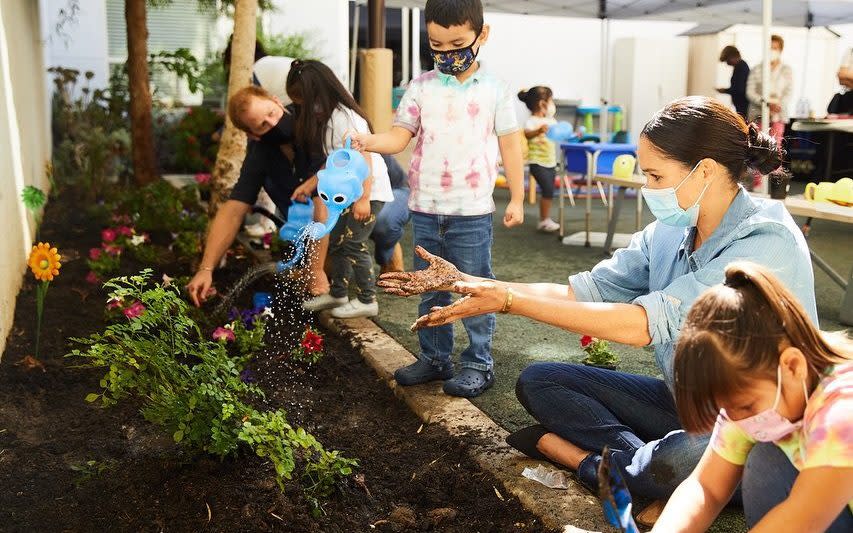 The Duchess of Sussex has worked on projects with children that involve gardening