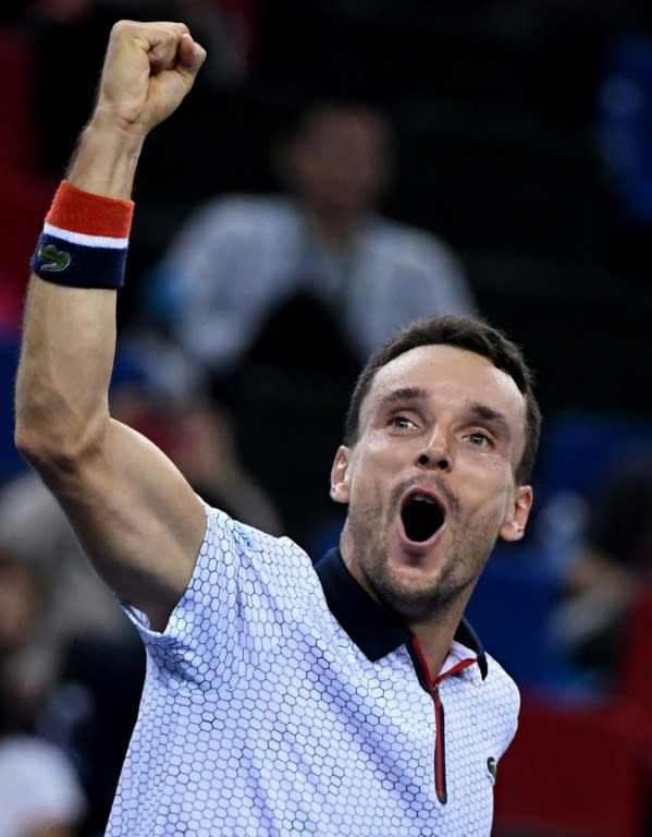 Spain's Roberto Bautista Agut celebrates victory against Jo-Wilfried Tsonga of France in the quarter-finals of the Shanghai Masters on October 14, 2016