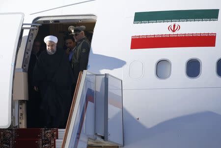 Iranian President Hassan Rouhani disembarks from a plane upon his arrival at Vnukovo International Airport in Moscow, Russia March 27, 2017. REUTERS/Maxim Shemetov