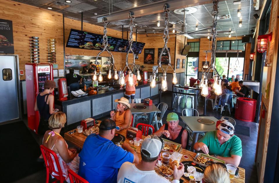The BurgerFi restaurant at Harbourside Place in Jupiter has closed. The space is now occupied by a restaurant called Pura Vida.