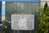 FILE - A memorial plaque for the eleven athletes from Israel and one German police officer were killed in a terrorist attack during the Olympic Games 1972, stands at the former accommodation of the Israeli team in the Olympic village in Munich, Germany, Saturday, Aug. 27, 2022. The German and Israeli presidents are to join relatives of the 11 Israeli athletes killed in the attack by Palestinian militants on the 1972 Munich Olympics to mark the 50th anniversary. (AP Photo/Matthias Schrader, File)