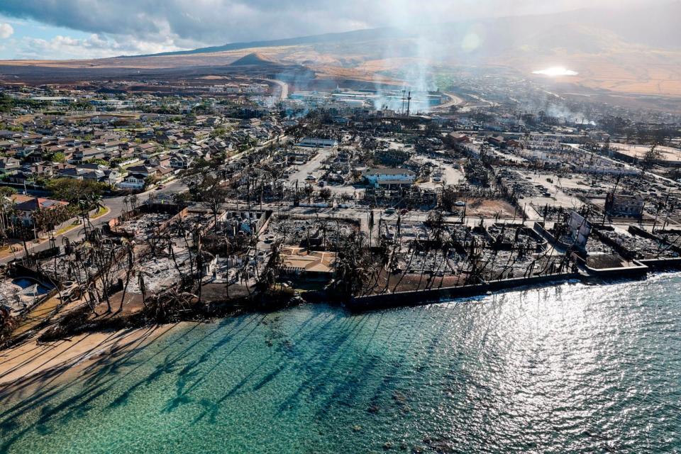 PHOTO: In this Aug. 11, 2023 file photo, buildings still smolder days after a wildfire gutted downtown Lahaina, Hawaii.   (Robert Gauthier/Los Angeles Times via Getty Images, FILE)