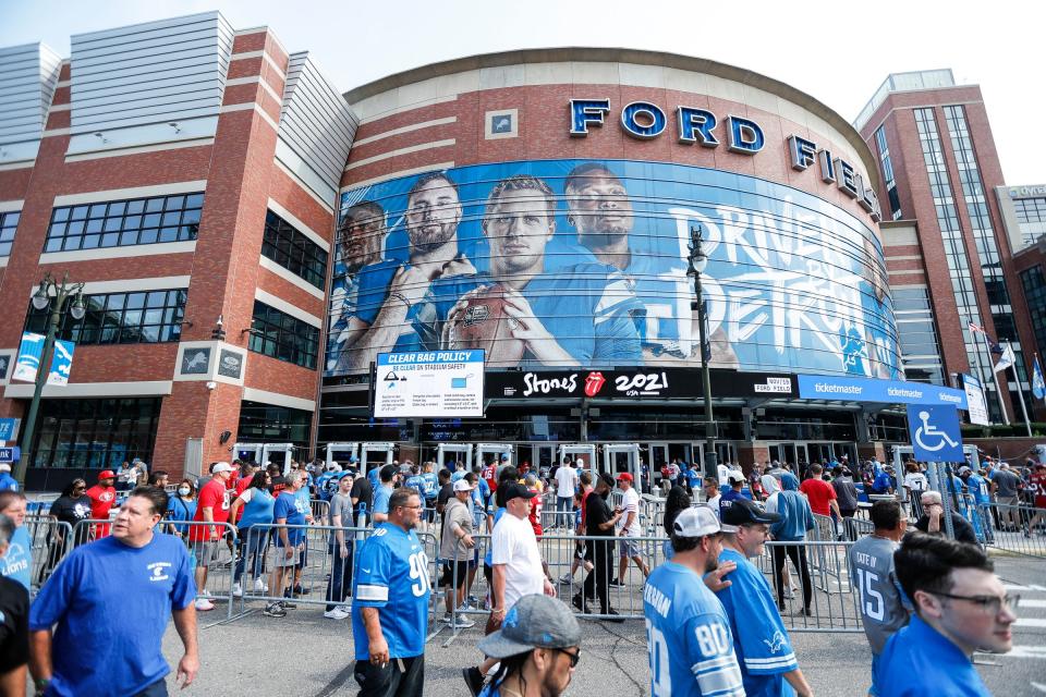 Detroit Lions fans line up to enter enter Ford Field in Detroit before the opener against the San Francisco 49ers on Sunday, Sept. 12, 2021.