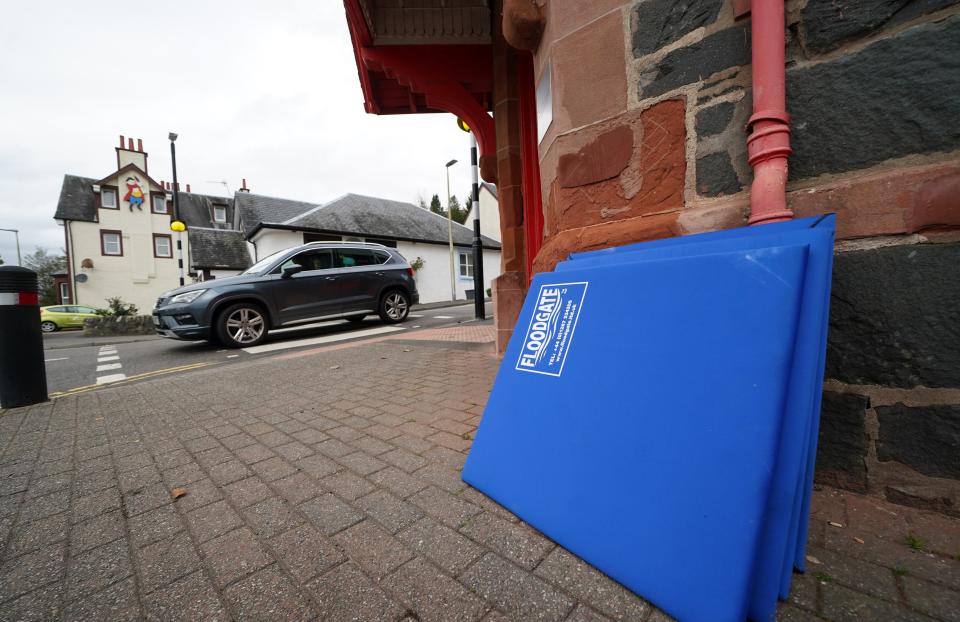 Flood prevention measures sit against a wall in the main street in Aberfoyle in Perthshire (Andrew Milligan/PA Wire)