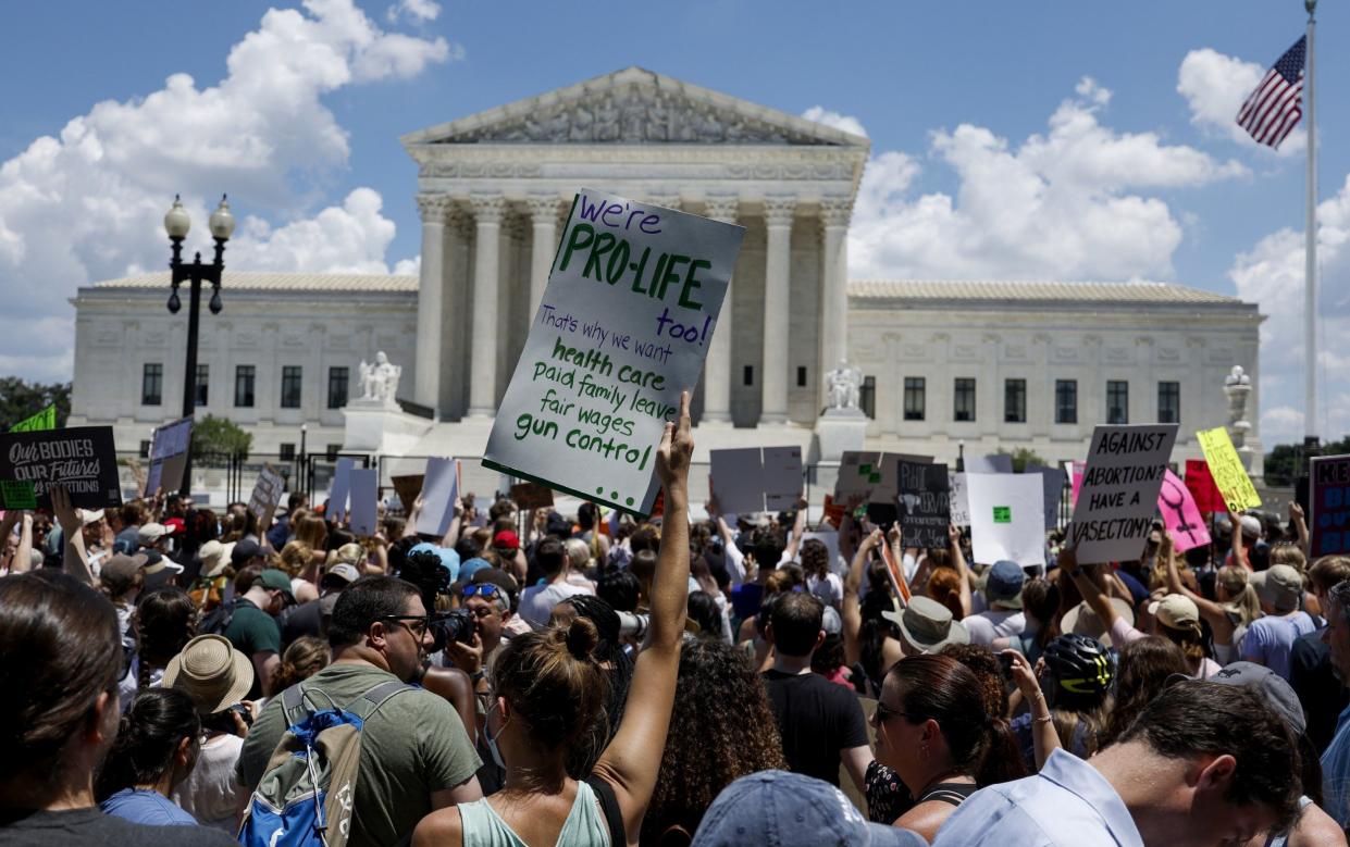 Activists fill the street outside the US Supreme Court during a protest in the wake of the decision overturning Roe v Wade - Getty Images