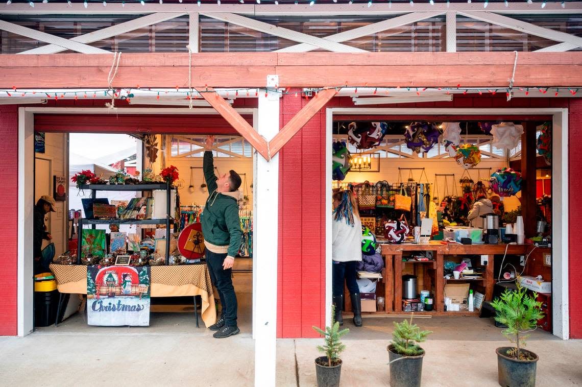 Red Barn Market owner Dennis Kupchenko opens the doors for holiday shopping in 2021. This year, the store is hosting special holiday activities every Friday-Sunday through Dec. 18.