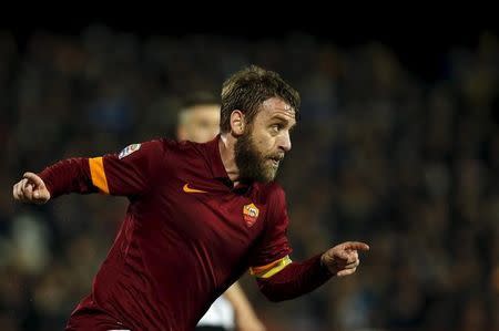 AS Roma's Daniele De Rossi celebrates after scoring against Cesena during their Italian Serie A soccer match in Cesena March 22, 2015. REUTERS/Alessandro Garofalo