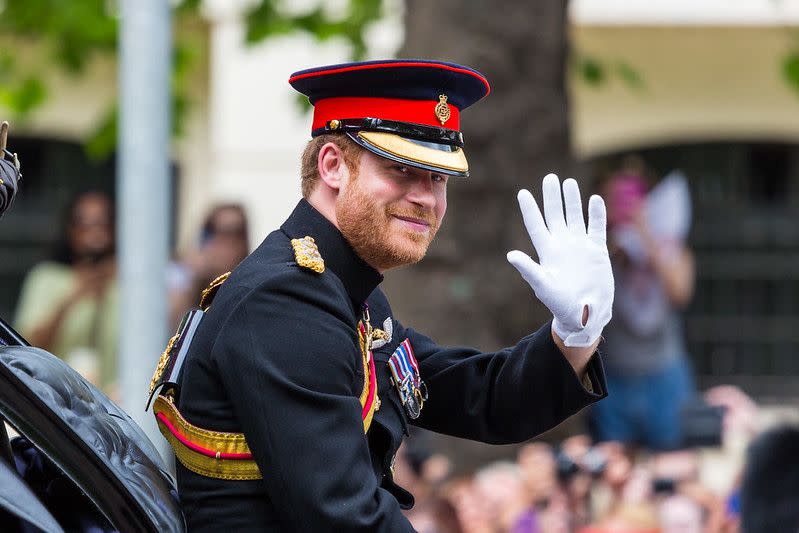 Prince Harry, wearing uniform of the Blues & Royals. Waves from a Ascot Landau.