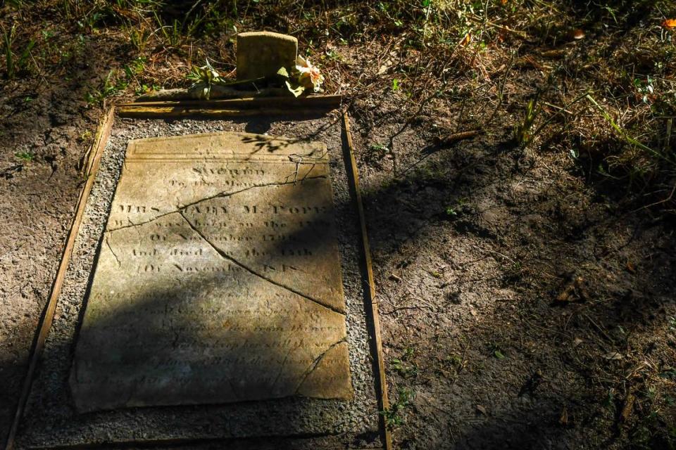 The grave of Mary Pope who died in November of 1818 rests under the canopy of the Cherry Hill Plantation Oak.