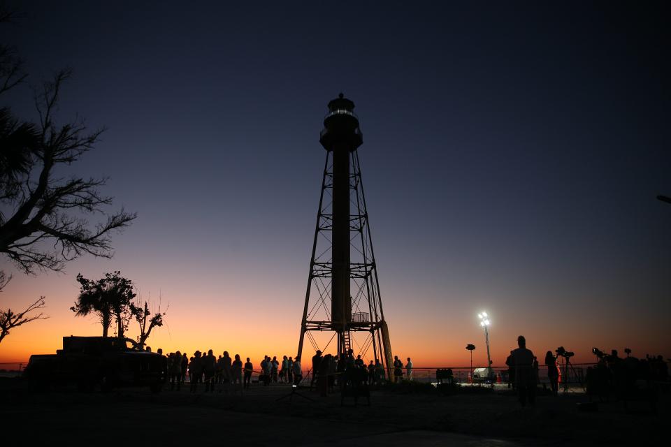 A relighting ceremony of the Sanibel Lighthouse was held on Tuesday, Feb. 28, 2023. Members of the community showed up for the 6 a.m. event. The light was turned on a few minutes after six. The lighthouse had been dark since Hurricane Ian slammed into Southwest Florida. One of the legs was washed away and the historic cottages were destroyed in the storm. The leg is being repaired.