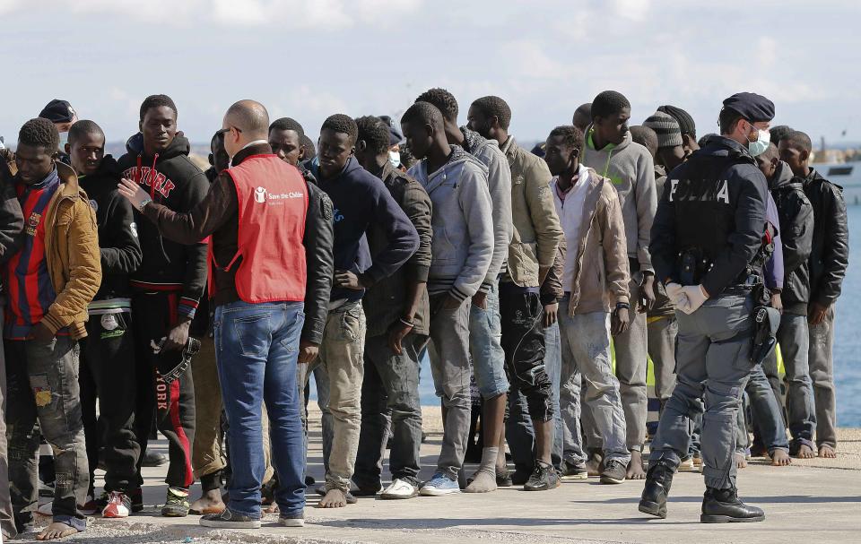 Migrants arrive at the Sicilian harbour of Pozzallo