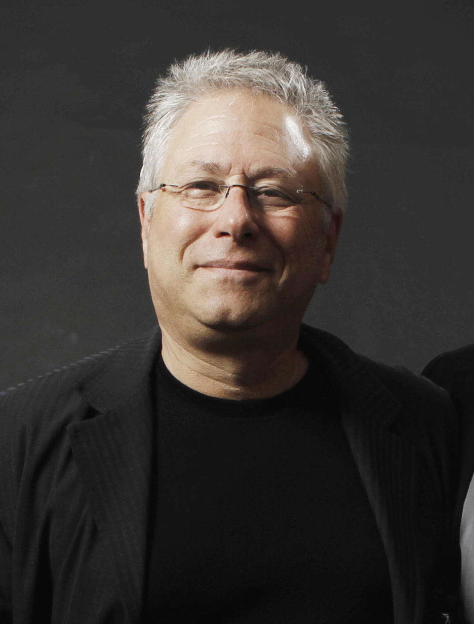 FILE - This Feb. 7, 2011 shows composer Songwriter Alan Menken at the Academy Award Nominees Luncheon in Beverly Hills, Calif. Menken is nominated for a Grammy Award for best theater album for the Broadway musical "Newsies." (AP Photo/Matt Sayles, file)