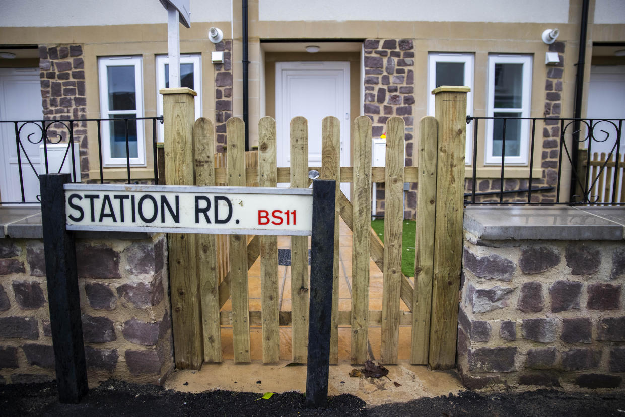 The entrance to one of the homes in Shirehampton, Bristol, has been built behind the existing Station Road street sign, which is now completely blocking the gate (swns)