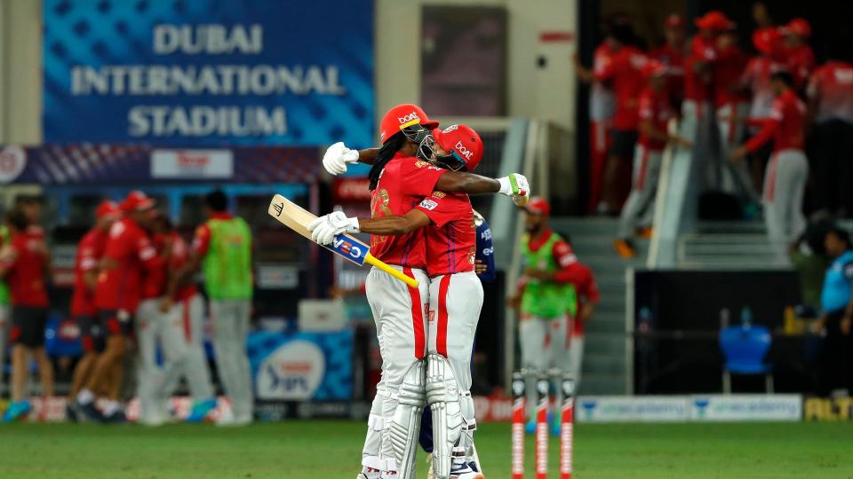 Chris Gayle and Mayank Agarwal of Kings XI Punjab celebrate their win against Mumbai Indians after the double Super Over.