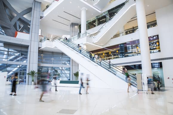 The inside of a busy shopping mall