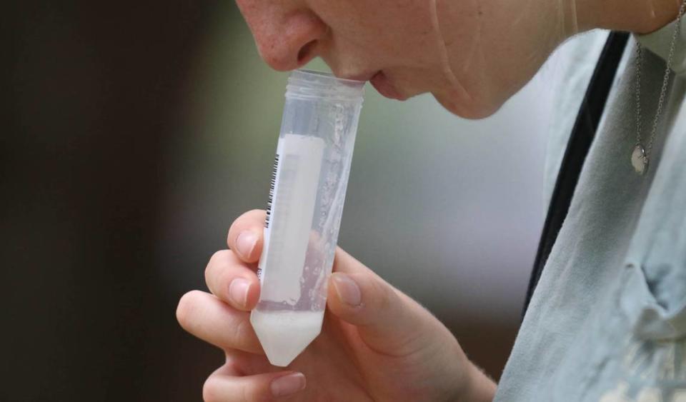 A USC student spits into a collection vial for a saliva based COVID-19 test being administered on campus. The University of South Carolina is encouraging weekly tests to help control the spread of the coronavirus. Results from the test take less than 24 hours. 8/19/20