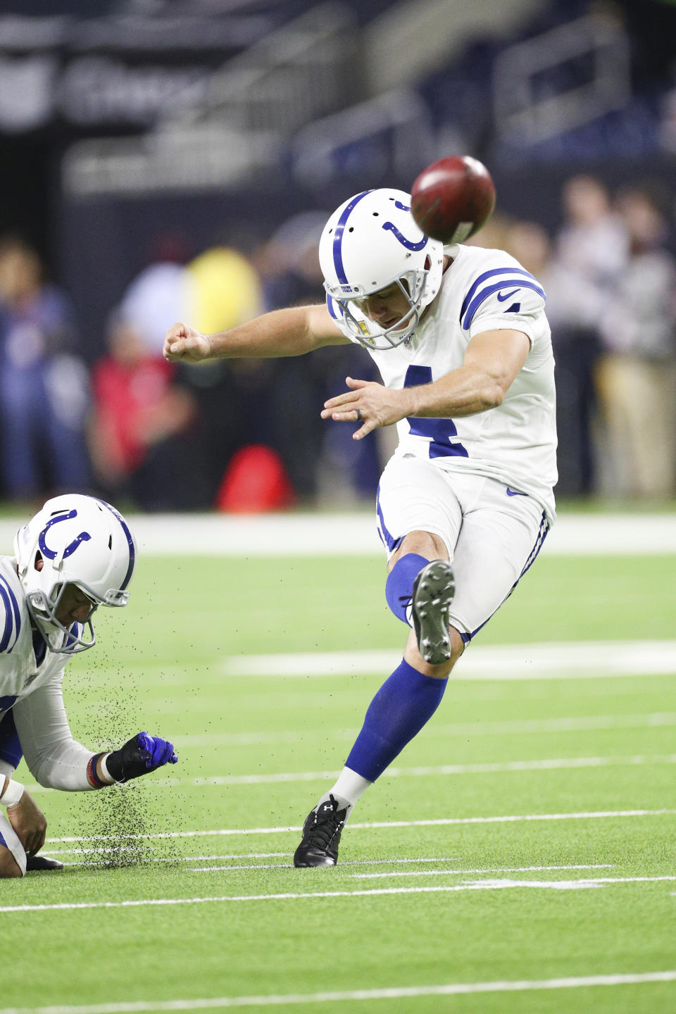 Indianapolis Colts kicker Adam Vinatieri (4) kicks a field goal during warm-ups in an NFL game against the Houston Texans, Thursday, Nov. 21, 2019 in Houston. The Texans defeated the Colts 20-17. (Margaret Bowles via AP)
