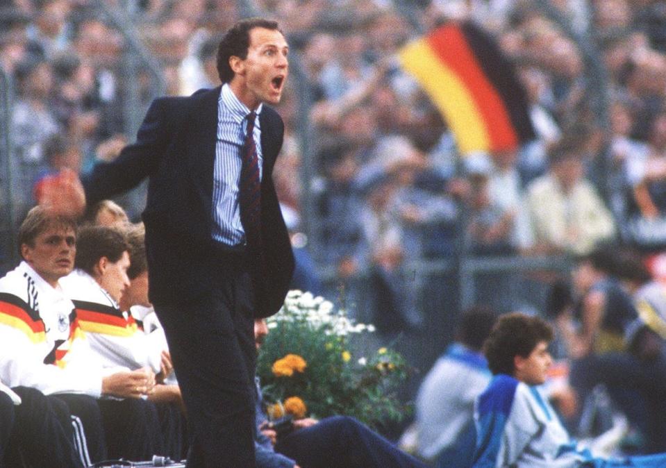 The German was one of only three men to lift the World Cup as a player and manager (Bongarts/Getty Images)