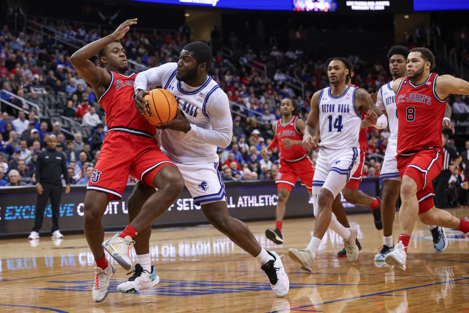 Jan 16, 2024; Newark, New Jersey, USA; Seton Hall Pirates guard Dylan Addae-Wusu (0) drives to the basket as St. John's Red Storm guard Nahiem Alleyne (4) defends during the second half at Prudential CenterMandatory Credit: Vincent Carchietta-USA TODAY Sports