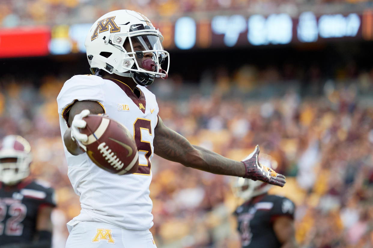 Minnesota WR Tyler Johnson celebrates scoring a touchdown against New Mexico State (Getty Images).