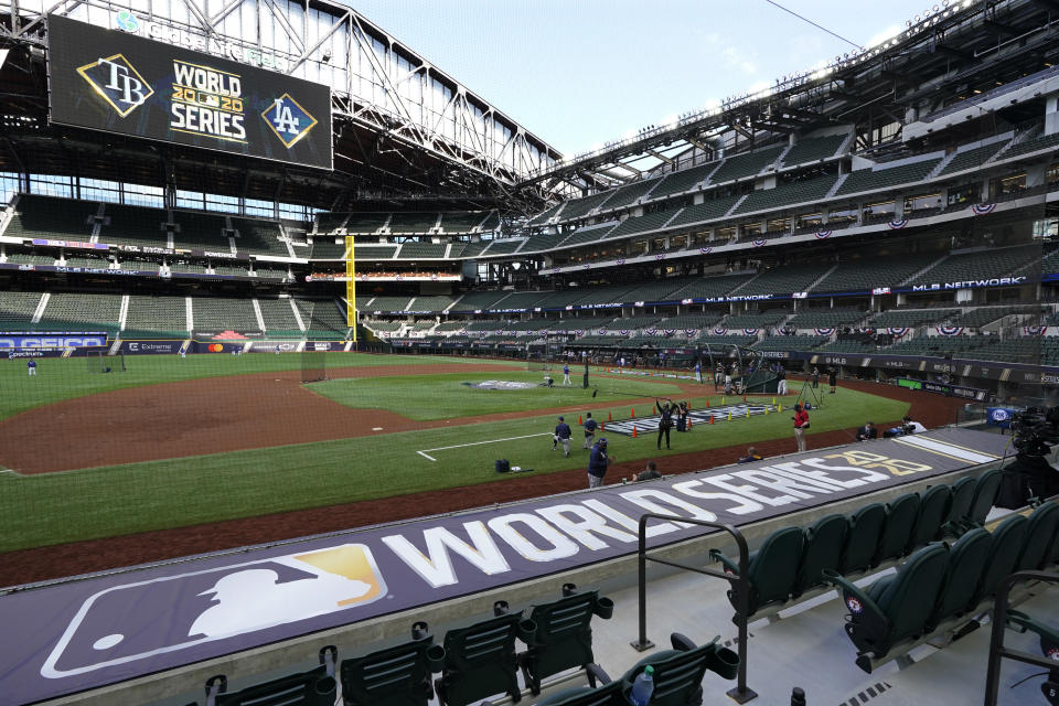 Members of the Tampa Bay Rays warms up during batting practice before Game 1 of the baseball World Series against the Los Angeles Dodgers Tuesday, Oct. 20, 2020, in Arlington, Texas. (AP Photo/Tony Gutierrez)