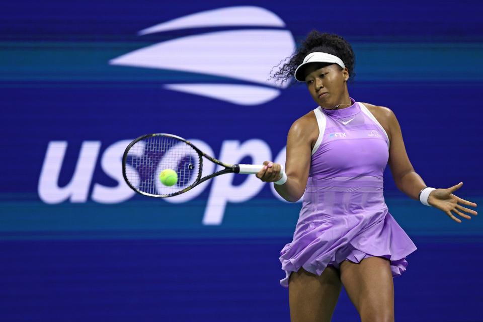 Naomi Osaka of Japan plays a forehand against Danielle Collins of the United States in their Women's Singles First Round match on Day Two of the 2022 US Open at USTA Billie Jean King National Tennis Center on August 30, 2022 in the Flushing neighborhood of the Queens borough of New York City.