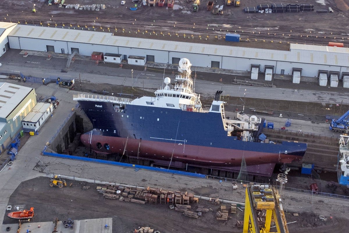 The ship Petrel toppled on to its side at Imperial Dock in Leith, Edinburgh (Jane Barlow/PA) (PA Wire)