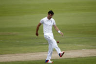 England's James Anderson kicks a ball during the fourth cricket test match against South Africa in Centurion, South Africa, January 22, 2016. REUTERS/Siphiwe Sibeko