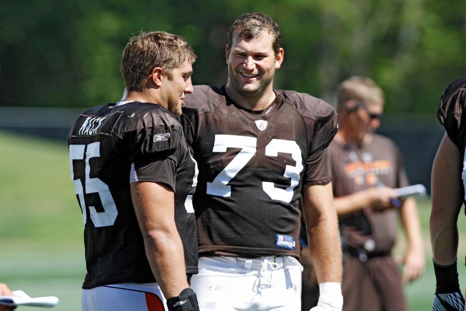 Browns offensive tackle Joe Thomas (73) talks with center Alex Mack at training camp, Aug. 29, 2011.