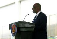 Haiti's new Prime Minister Ariel Henry speaks during his inauguration