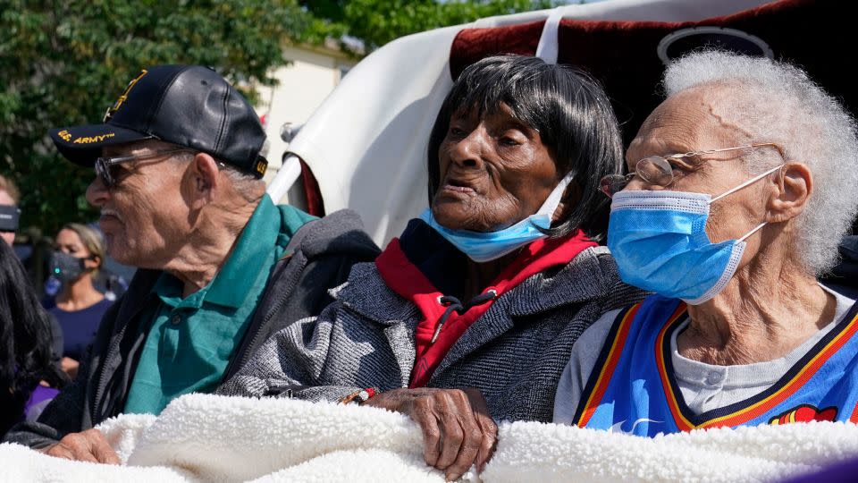 Viola Fletcher, right, the oldest living survivor of the Tulsa race massacre, waits with fellow survivors, her brother Hughes Van Ellis Sr., left, and Lessie Benningfield Randle, center, for a protest march Friday, May 28, 2021, in Tulsa, Oklahoma. - Sue Ogrocki/AP