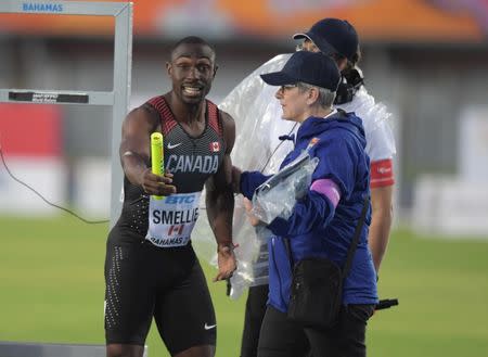 Apr 23, 2017; Nassau, Bahamas; Gavin Smellie argues with officials after being called for a false start in a 4 x 200m relay heat during the IAAF World Relays at Thomas A. Robinson Stadium. Mandatory Credit: Kirby Lee-USA TODAY Sports